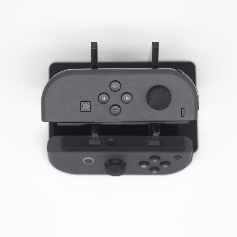 Gray Nintendo Switch Joy-Con L and R wireless controller pair with wrist straps