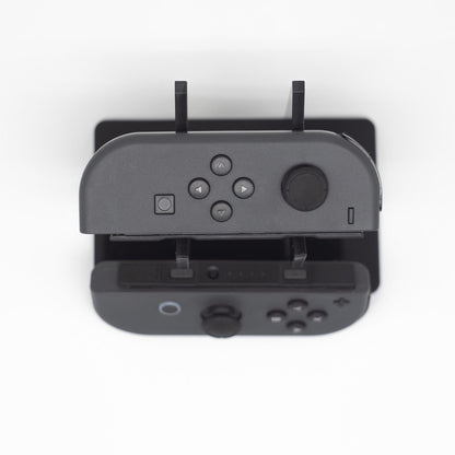 Gray Nintendo Switch Joy-Con L and R wireless controller pair with wrist straps