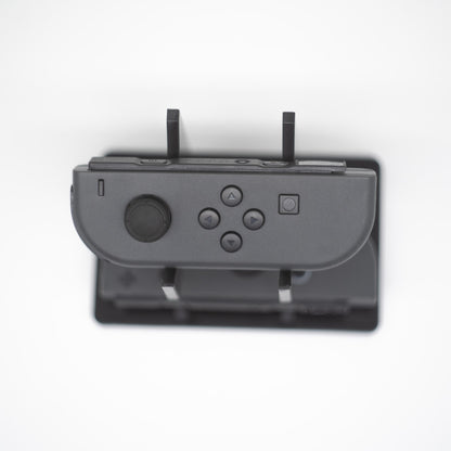 Gray Nintendo Switch Joy-Con L and R wireless controller pair with wrist straps
