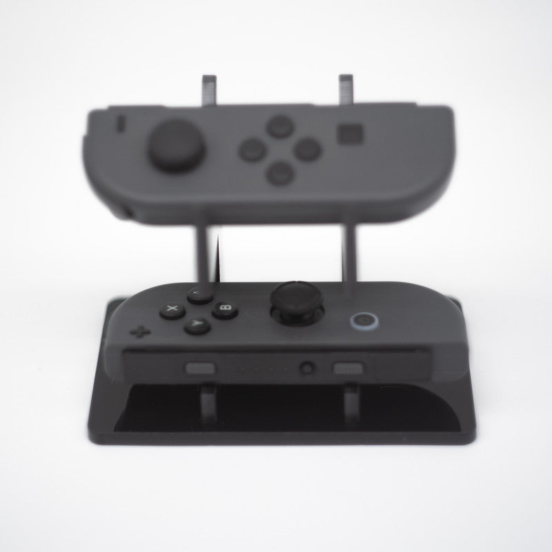 Gray Nintendo Switch Joy-Con L and R wireless controller pair with wrist straps