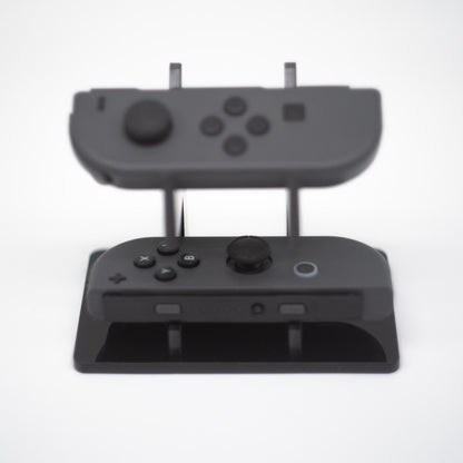 Gray Nintendo Switch Joy-Con L and R wireless controller pair with wrist straps