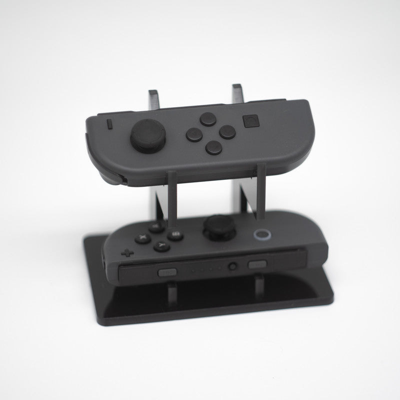 Gray Nintendo Switch Joy-Con L and R wireless controller pair with wrist straps