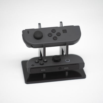 Gray Nintendo Switch Joy-Con L and R wireless controller pair with wrist straps