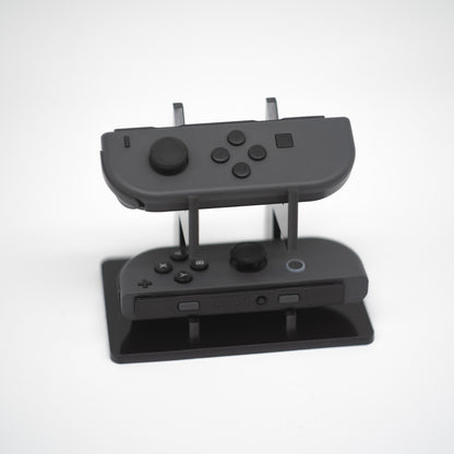 Gray Nintendo Switch Joy-Con L and R wireless controller pair with wrist straps