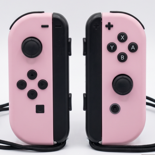 Pastel pink Nintendo Switch Joy-Con L and R wireless controller pair with wrist straps